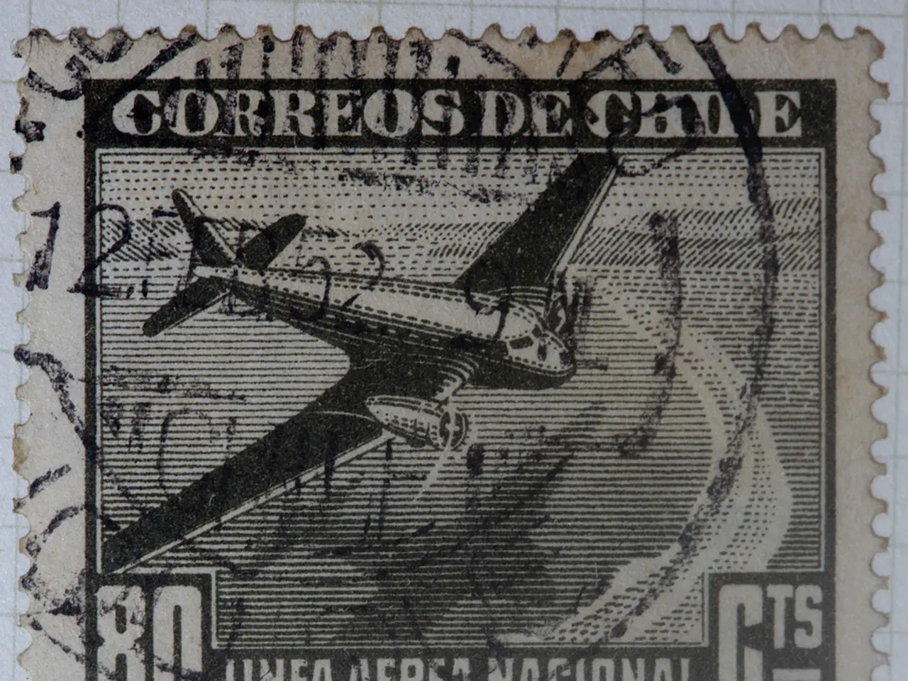 There is a stamp paper attached to a white color surface as we can see in the middle of this image.