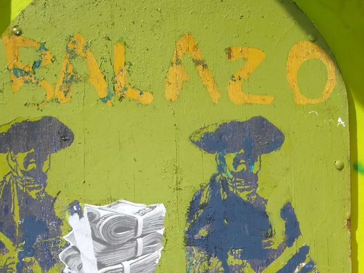 In this picture there is a green color wooden board with some painted craft.