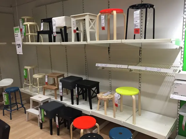 In this image there are two racks on which there are different kind of stools on it. To the rock...