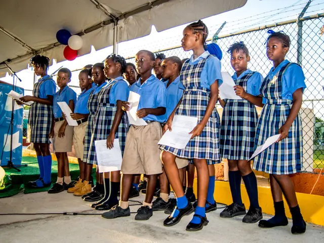 In the picture we can see some school children are standing on the path with school uniforms and...
